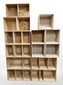 A group of pine open shelves.