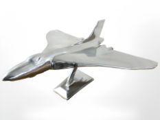 A chrome desktop model of a Vulcan fighter jet, length 40 cm.