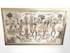 A large canvas print depicting a village scene in gilt frame, overall 213 cm x 130 cm.