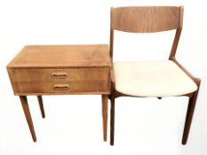 A 20th century Danish teak two drawer low table and a dining chair.