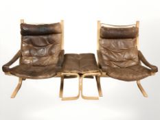 A pair of 20th century Scandinavian bentwood framed tan leather lounge armchairs and a matching