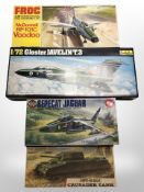 A group of scale model kits,