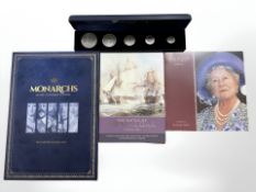 A group of commemorative issue coins to include a George V silver three pence piece,