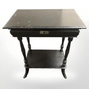 An ebonised occasional table fitted a drawer, width 60 cm.