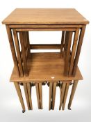 Two teak nests of tables.