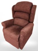 An electric reclining armchair