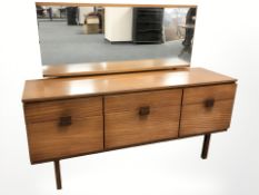A teak mirror backed dressing table,