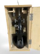 A Sui microscope in wooden box, with accessories.