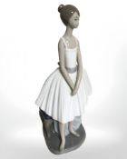 A Nao figure of a standing ballerina.
