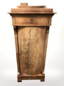 A continental walnut single drawer cabinet,