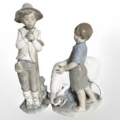Two Nao figures of shepherd boys.