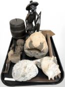 A carved coconut ornament, hardwood figures, two sea shells, letter opener,