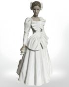 A Nao figure of a bride.