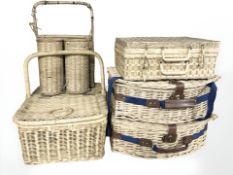 Four wicker hampers,