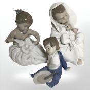 Three Nao figures of babies.