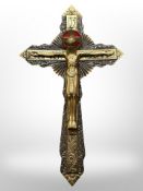An Art Deco patinated metal and enamelled crucifix,