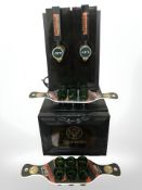 A Jagermeister Cold Brew coffee dispenser and two sets of shot glasses