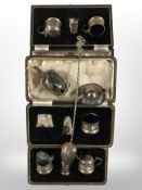 Three silver part cruet sets, further mustard pot,