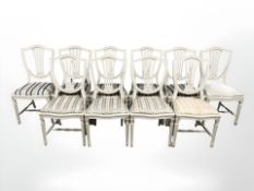 A set of ten continental painted shield back dining chairs