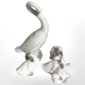 Three Nao figures of geese and a further similar Spanish figure.