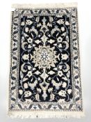 A Nain rug, Central Iran, 96 cm x 57 cm.