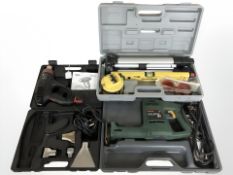 A Skil heat gun, a Workzone laser level and a Bosch PFZ550E saw.