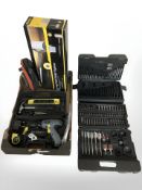 A Cougar paint roller, extension lead, drill bit set, cordless drill, allen keys and other hardware.