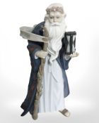A Lladro figure of father time celebrating the millennium.