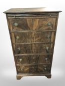 A rosewood five drawer tall boy,