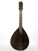 A vintage six string lute guitar.