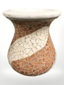 A decorative mosaic earthenware vase,