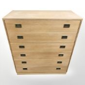 A Danish blond oak veneered secreatire chest,