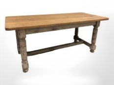 An oak refectory dining table, 182 cm x 83 cm x 77 cm.