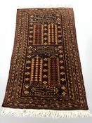 A Balouch rug, Afghanistan, 170 cm x 91 cm.