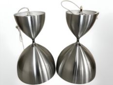 A pair of Danish brushed metal finish hour glass shaped light shades, height 55 cm.