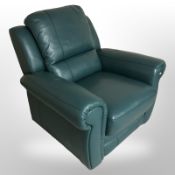 A contemporary teal leather armchair