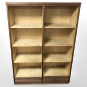 A Danish teak tambour front cabinet with shelved interior, 114 cm x 41 cm x 159 cm.