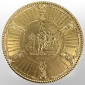 A French gilt-bronze disc calendar dated 1965, diameter 9.
