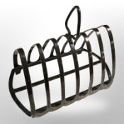 A silver seven bar toast rack, Birmingham marks, width 13.