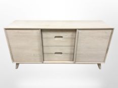 Contemporary light oak sideboard fitted with drawers,