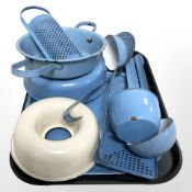 A group of 20th century enamel kitchen wares including ladles, collander,