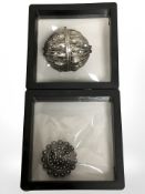 A Yemeni silver bead, length 4.5 cm, and an Israeli silver brooch / pendant.