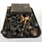 A late 19th century Japanese lacquer export playing card box and a collection of pipes.