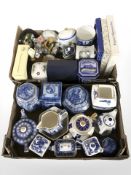 A collection of Ringtons caddies, teapots, tins,
