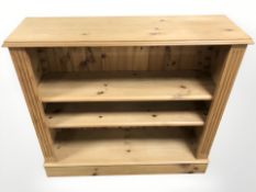 A modern pine open bookcase,