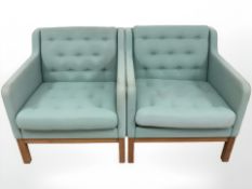 A pair of Danish turquoise upholstered armchairs.