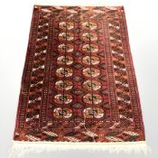 A Turkoman rug, 125 cm x 82 cm.