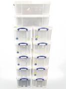 Twelve plastic storage boxes with snap-on lids,
