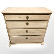 A continental stripped pine four drawer chest, 100 cm x 47 cm x 95 cm.