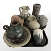 A group of Scandinavian studio pottery including figure of a recumbent bear, hedgehog money box,